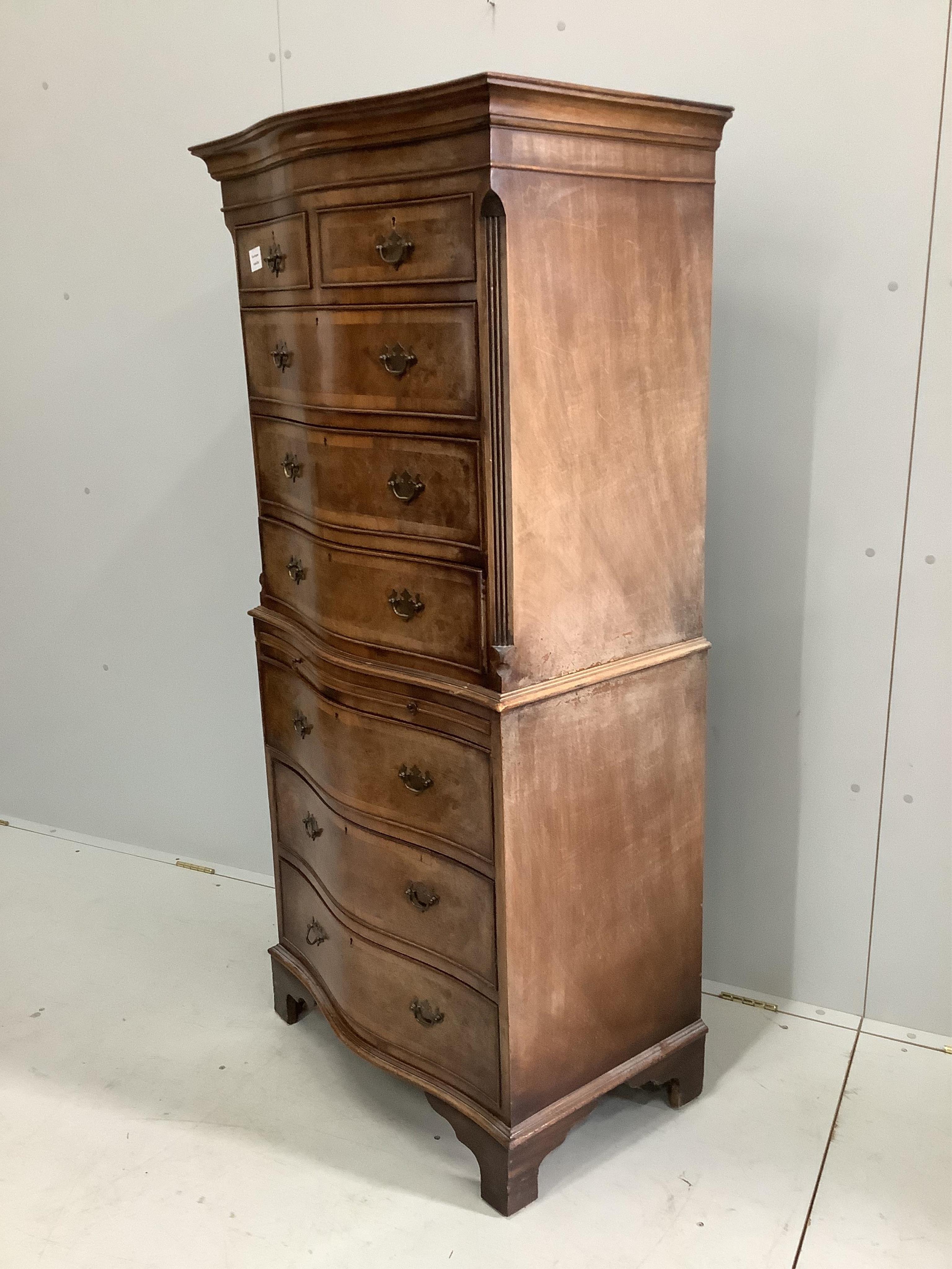 A reproduction George III style mahogany serpentine chest on chest, width 72cm, depth 48cm, height 156cm. Condition - fair